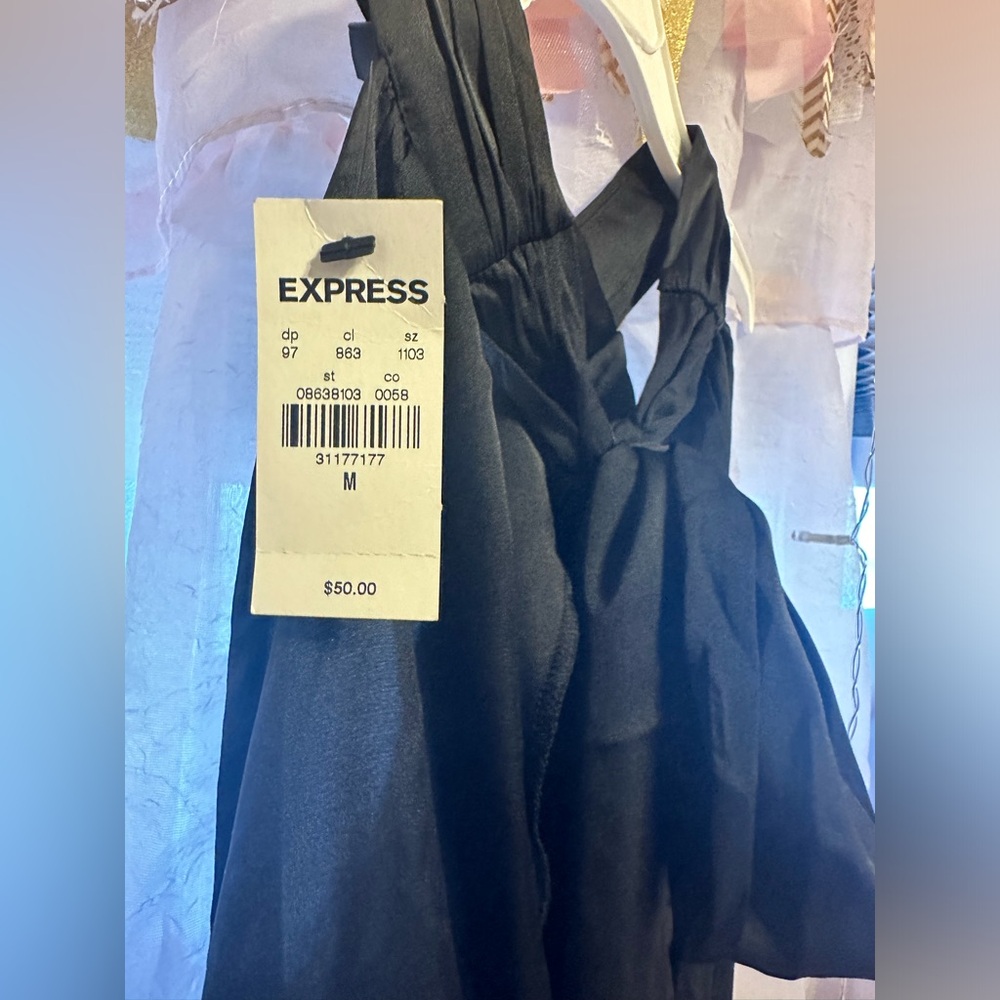 Black sexy top from Express, brand new with tags size M